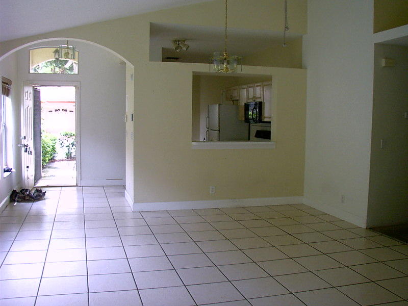 4026 Dorado Drive Riviera Beach, FL 33418 - Photo 4 of 15 View dining area to kitchen-front door