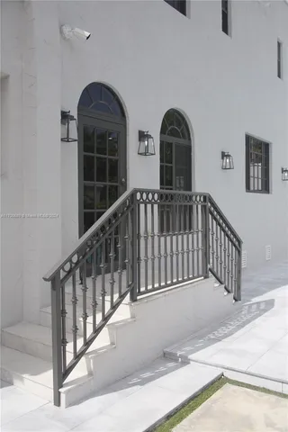 a front view of a house with a porch