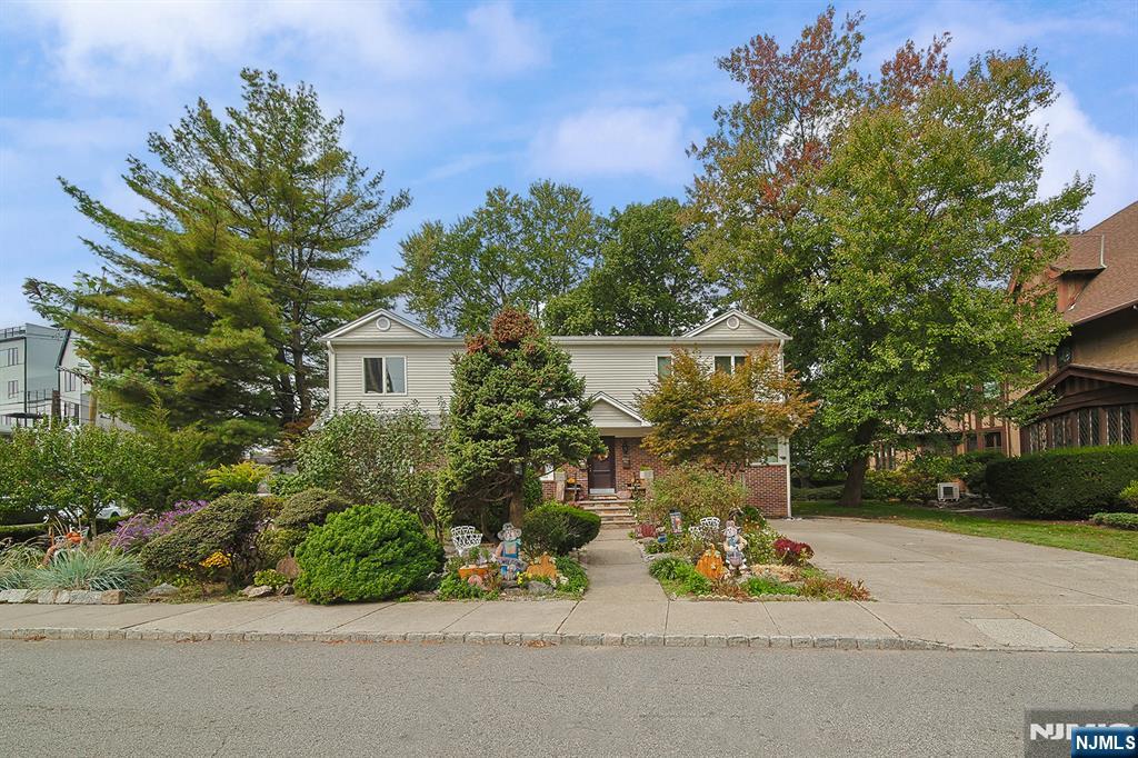 1003 Cumbermeade Road Fort Lee, NJ 07024 - Photo 1 of 38 front view of a house with a street