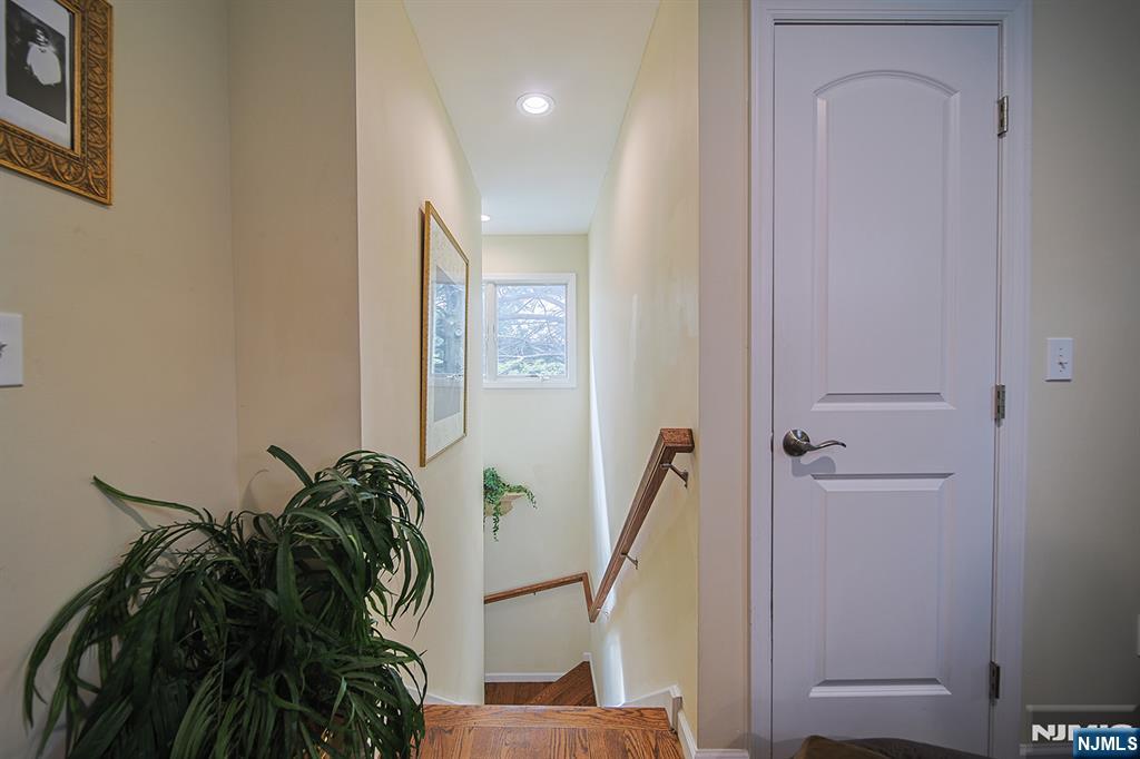 1003 Cumbermeade Road Fort Lee, NJ 07024 - Photo 13 of 38 a view of a hallway and a potted plant