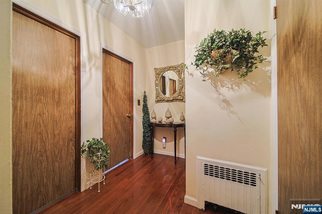 1003 Cumbermeade Road Fort Lee, NJ 07024 - Photo 21 of 38 a way to rooms with wooden floor