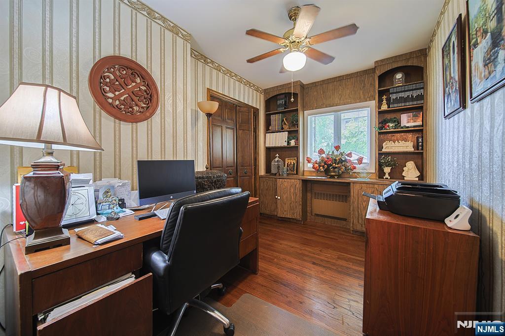 1003 Cumbermeade Road Fort Lee, NJ 07024 - Photo 27 of 38 a view of a workspace with furniture and a window