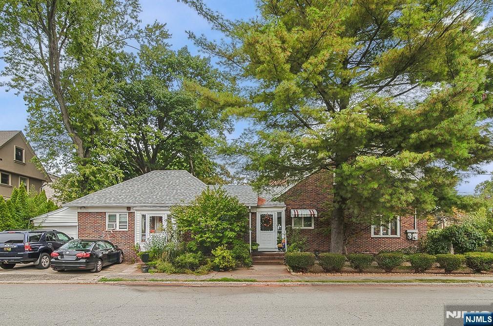 1003 Cumbermeade Road Fort Lee, NJ 07024 - Photo 3 of 38 front view of a house with a street