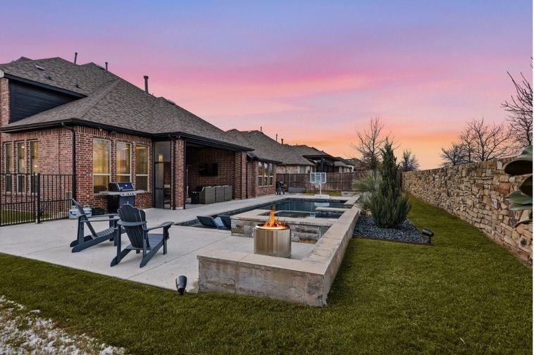 6508 Cooper Creek Road Flower Mound, TX 76226 - Photo 2 of 39 a view of a house with backyard and sitting area