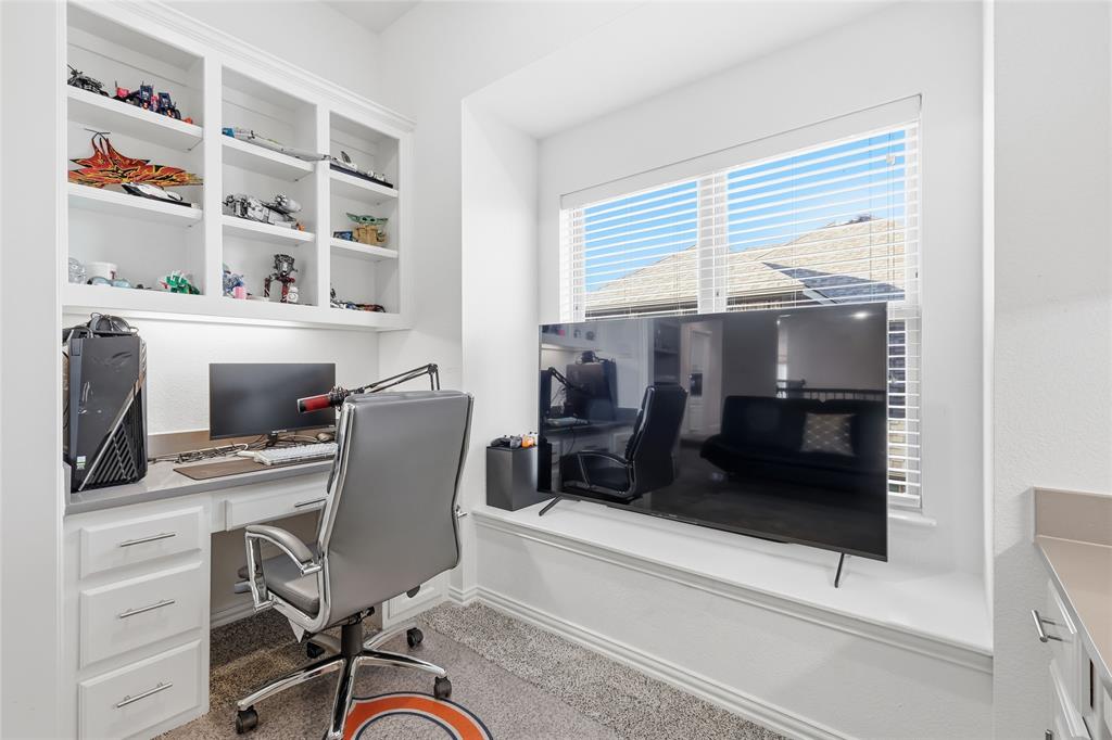 6508 Cooper Creek Road Flower Mound, TX 76226 - Photo 29 of 39 a workspace with a desk chair and painted walls