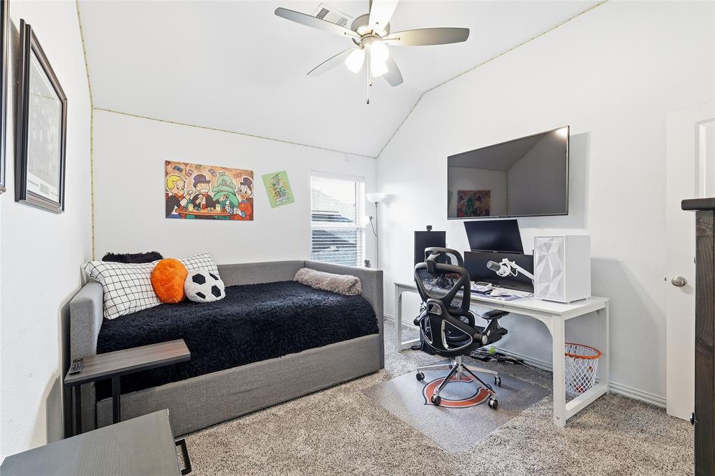 6508 Cooper Creek Road Flower Mound, TX 76226 - Photo 31 of 39 a bedroom with a workspace