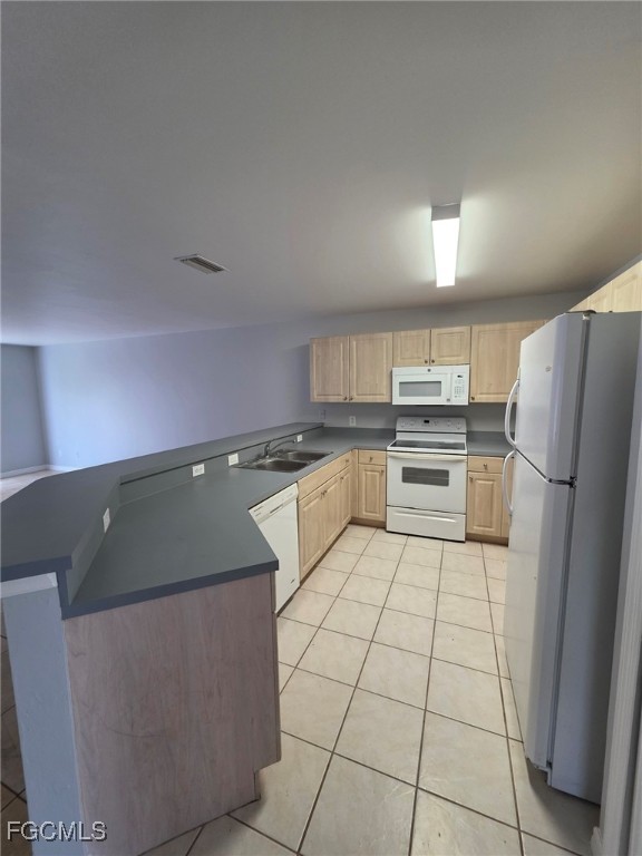 2502 Park Road Lehigh Acres, FL 33971 - Photo 8 of 17 a kitchen with stainless steel appliances granite countertop a refrigerator sink and cabinets