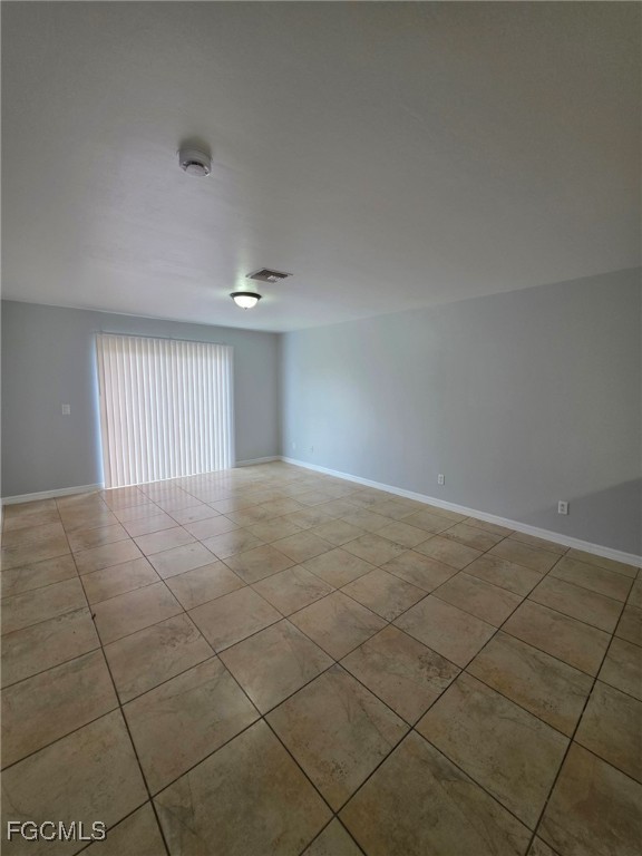 2502 Park Road Lehigh Acres, FL 33971 - Photo 10 of 17 a view of an empty room and window