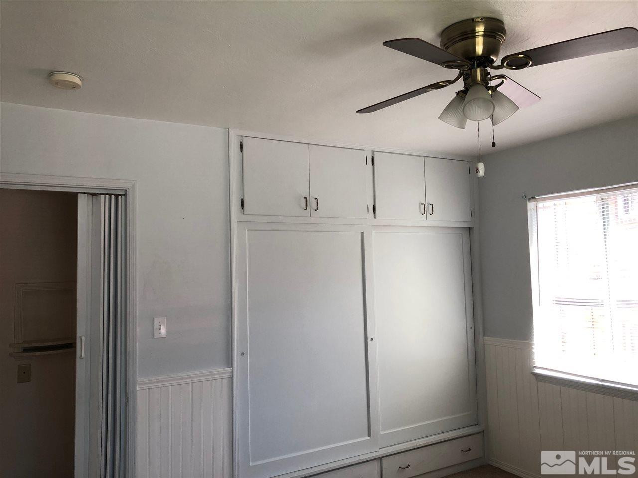 860 Yori Avenue Reno, NV 89502 - Photo 8 of 24 a view of an empty room with a window