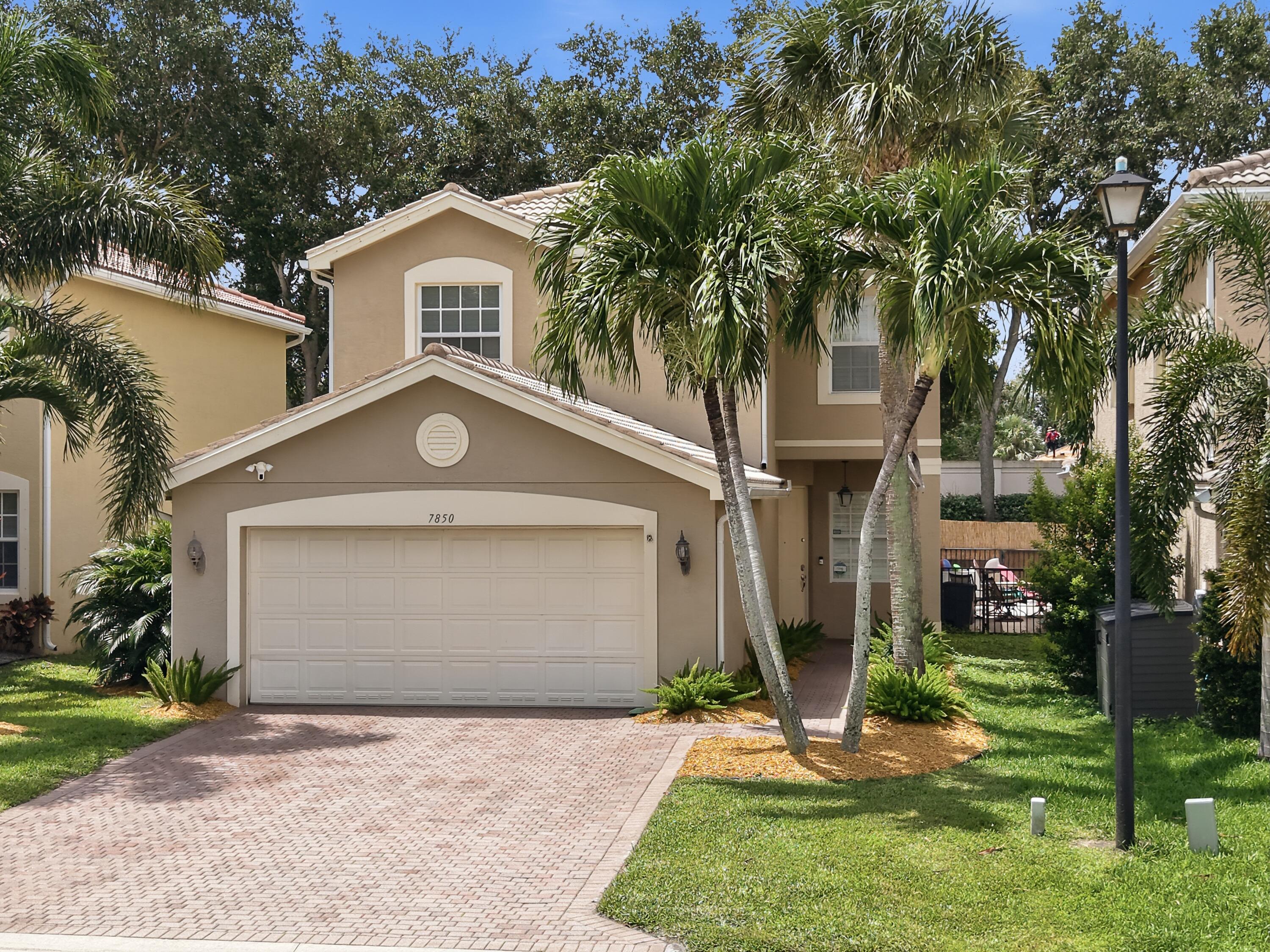 7850 Red Mahogany Road Boynton Beach, FL 33437 - Photo 3 of 40 Front of Home