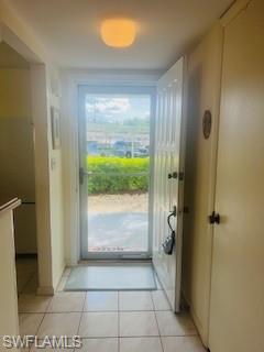 41 High Point Circle South, Unit 104 Naples, FL 34103 - Photo 11 of 16 a bathroom with a glass shower door