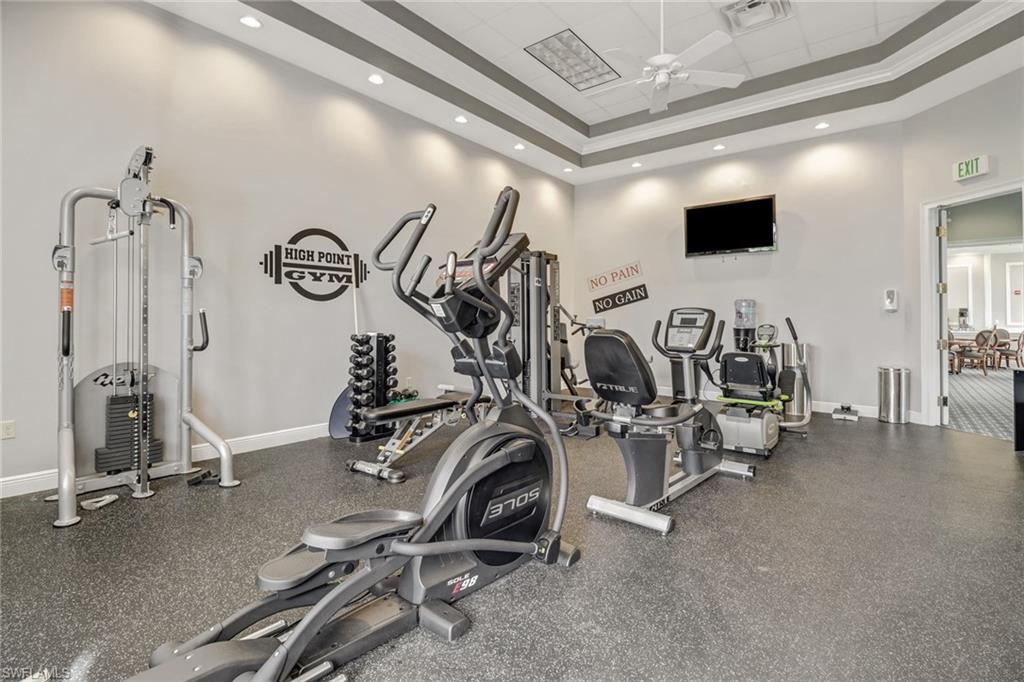 41 High Point Circle South, Unit 104 Naples, FL 34103 - Photo 14 of 16 a view of a room with gym equipment