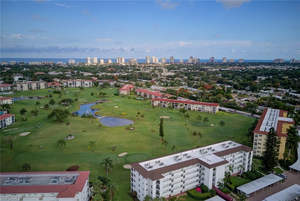 41 High Point Circle South, Unit 104 Naples, FL 34103 - Photo 15 of 16 an aerial view of a city