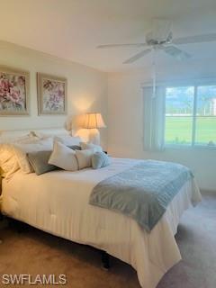 41 High Point Circle South, Unit 104 Naples, FL 34103 - Photo 4 of 16 a bedroom with a bed and window