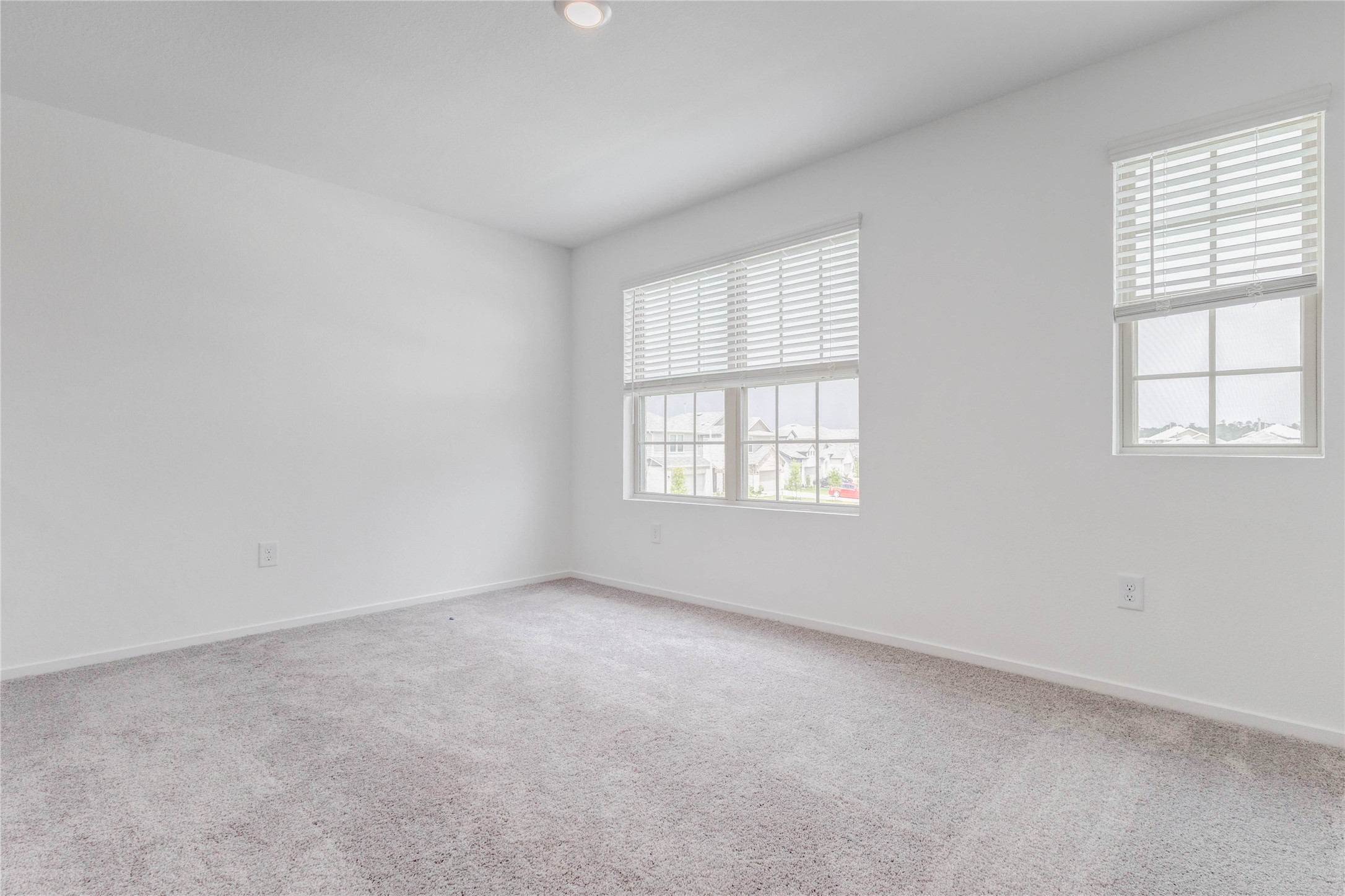 15011 Rustic Moon Road Conroe, TX 77302 - Photo 22 of 26 an empty room with windows