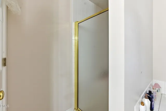 a balcony with furniture and a fireplace