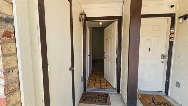 wooden floor in an empty room with a fireplace