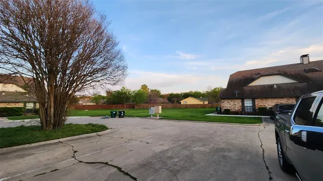 a view of a patio with a yard