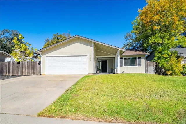 a view of a house with a garage