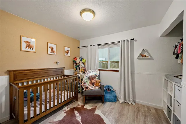 a living room with lots of furniture and a flat screen tv