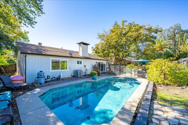 a view of a backyard with a patio