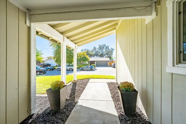 a view of a bathroom with a tub and door view