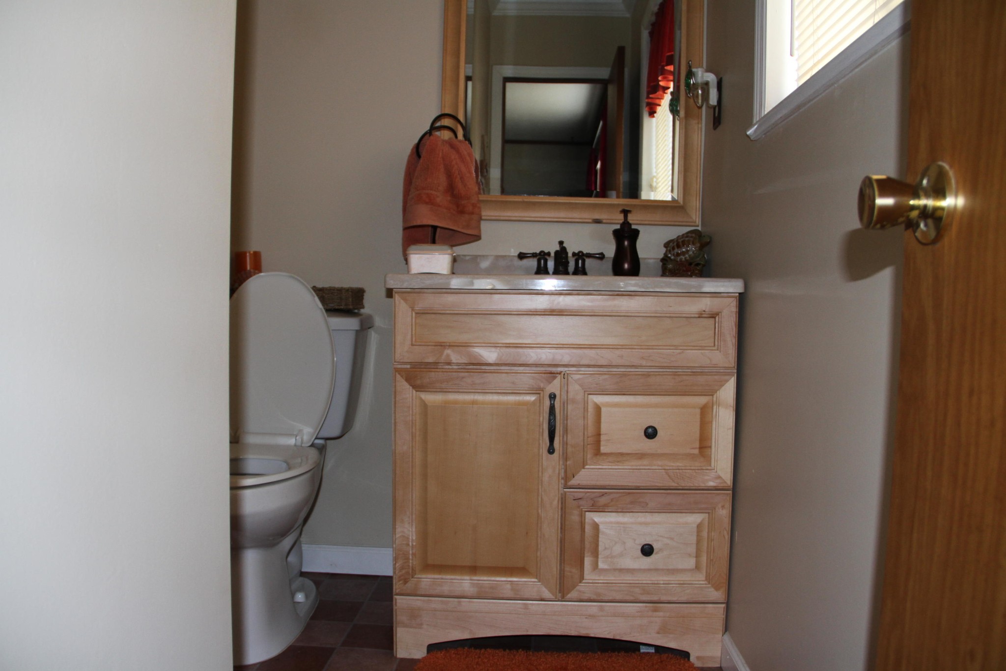 1111 Carding Machine Road Loudon, TN 37774 - Photo 11 of 21 a bathroom with a toilet sink and mirror
