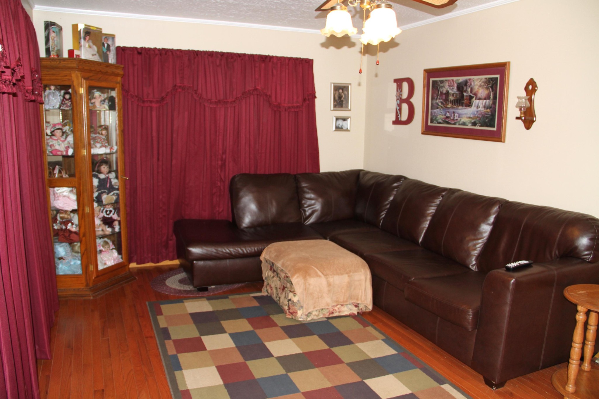 1111 Carding Machine Road Loudon, TN 37774 - Photo 2 of 21 a living room with furniture and a painting on the wall