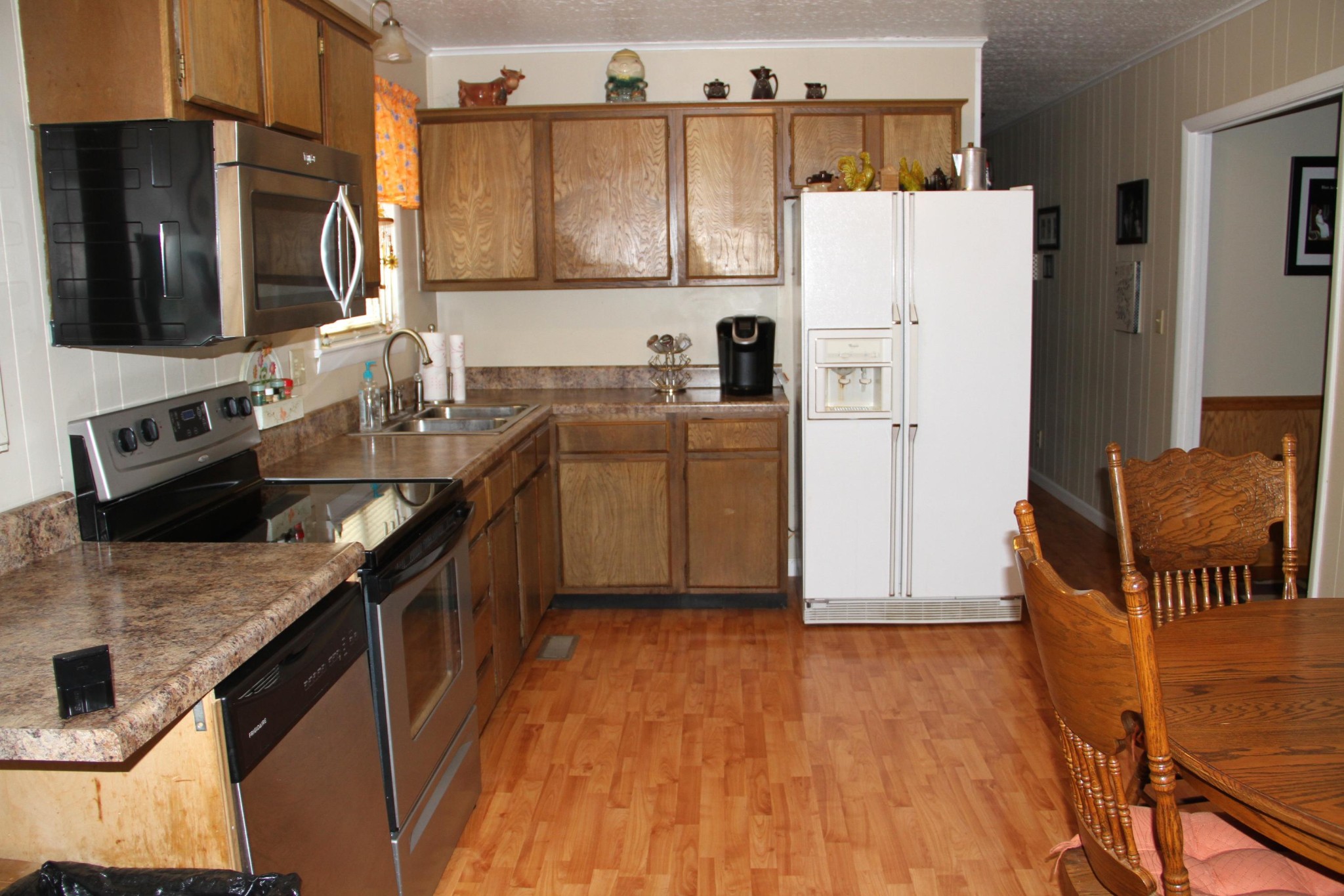 1111 Carding Machine Road Loudon, TN 37774 - Photo 7 of 21 a kitchen with stainless steel appliances granite countertop a refrigerator stove and sink