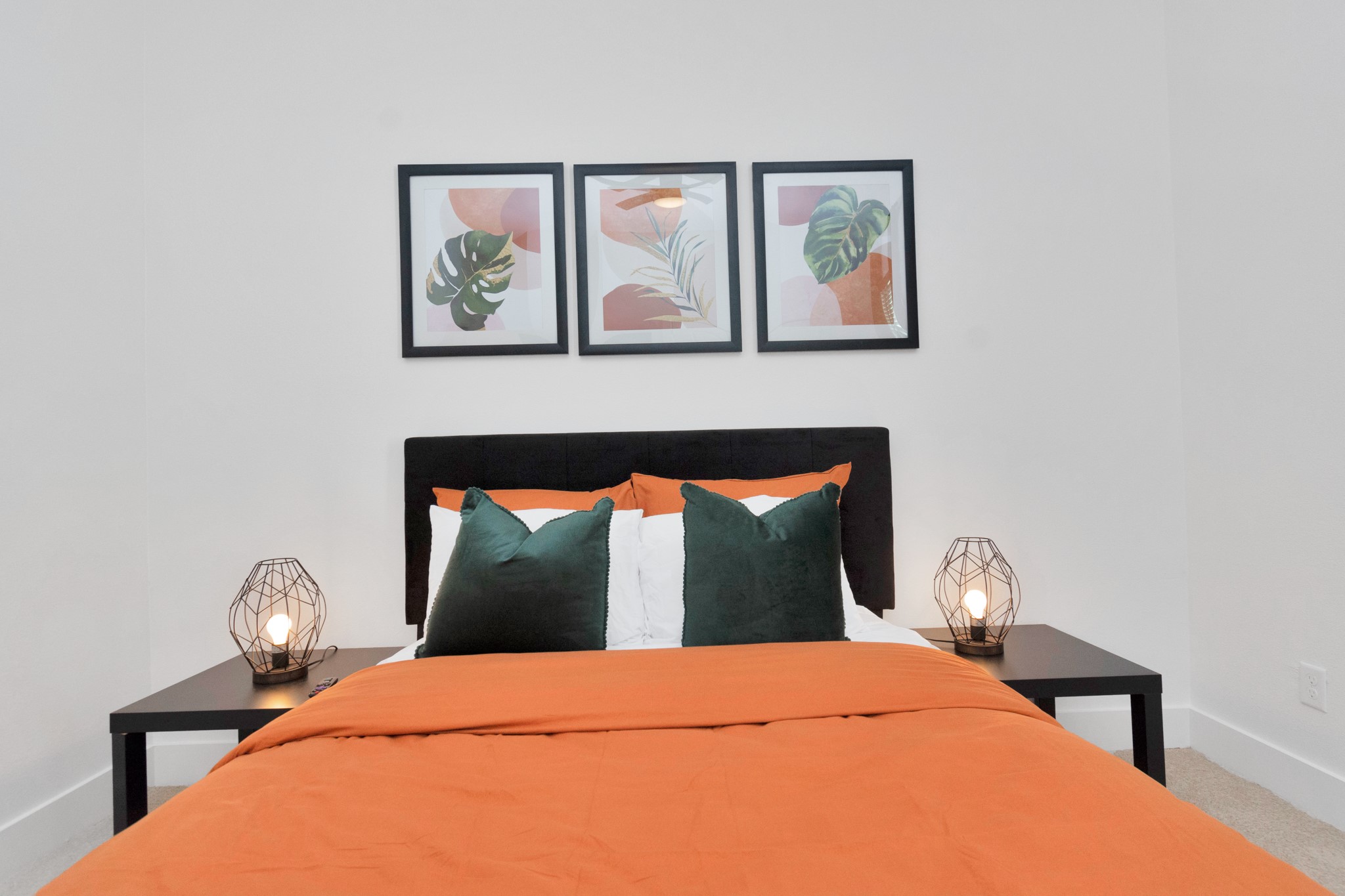 5308 Denmark Street Houston, TX 77028 - Photo 28 of 36 a bedroom with a bed and wooden floor