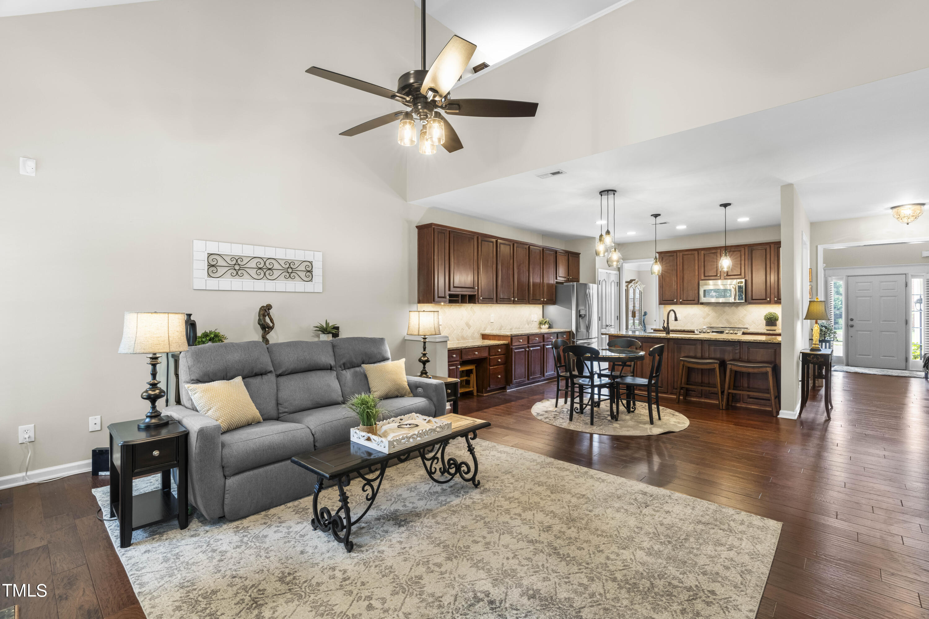 4604 Manassa Pope Lane Raleigh, NC 27612 - Photo 13 of 43 a living room with furniture and kitchen view