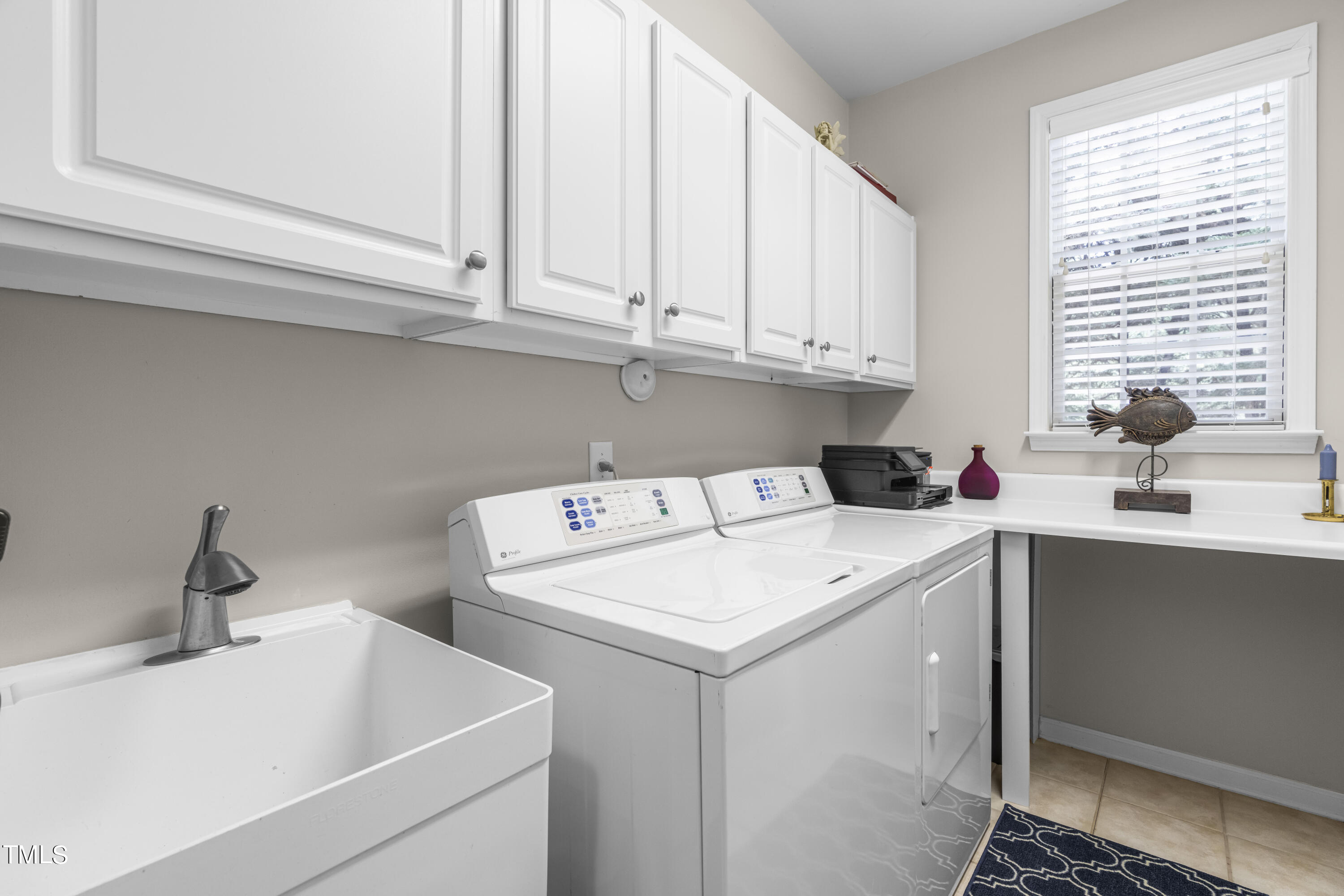 4604 Manassa Pope Lane Raleigh, NC 27612 - Photo 24 of 43 a utility room with dryer and washer
