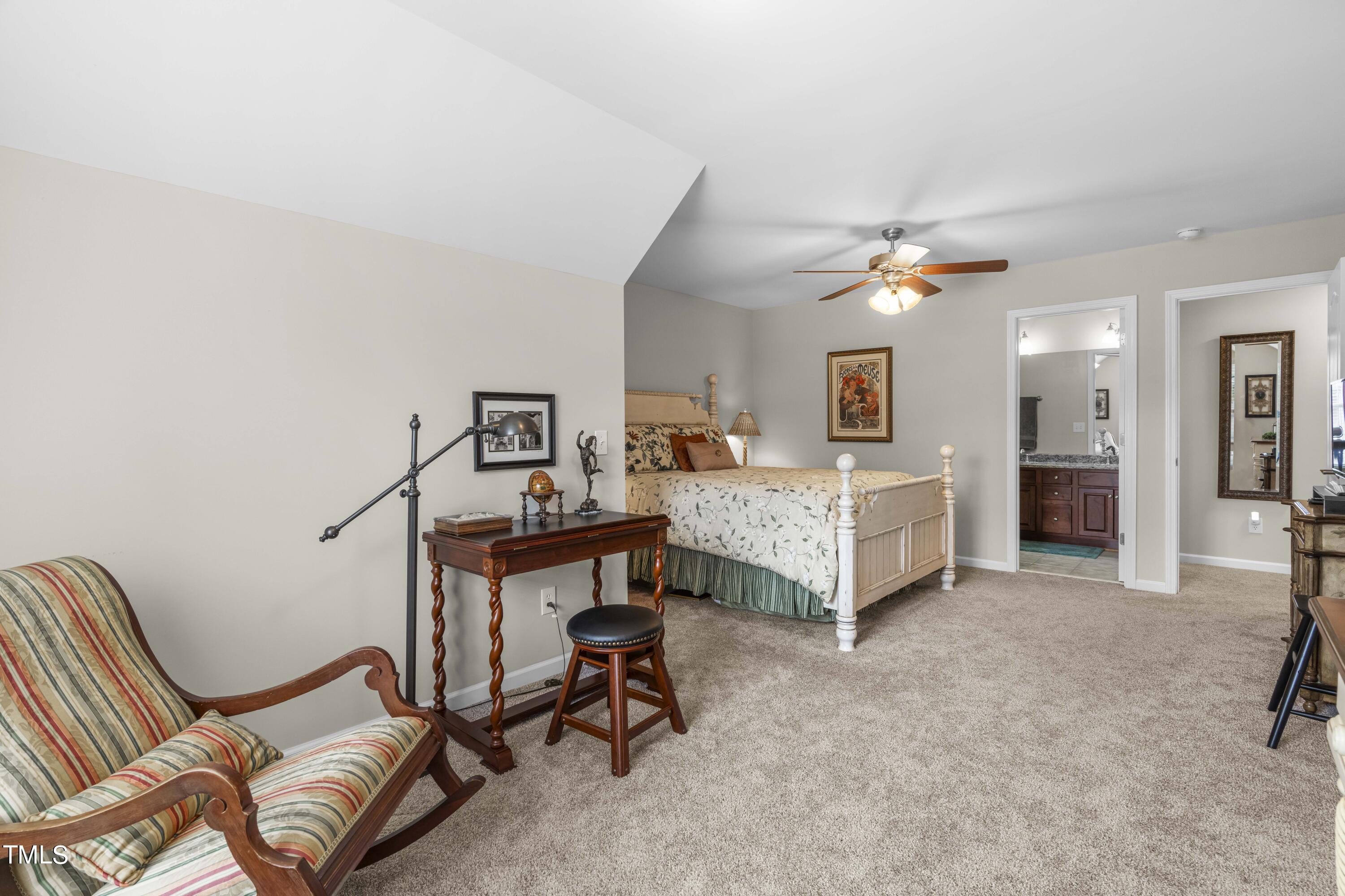 4604 Manassa Pope Lane Raleigh, NC 27612 - Photo 27 of 43 a living room with furniture and a table