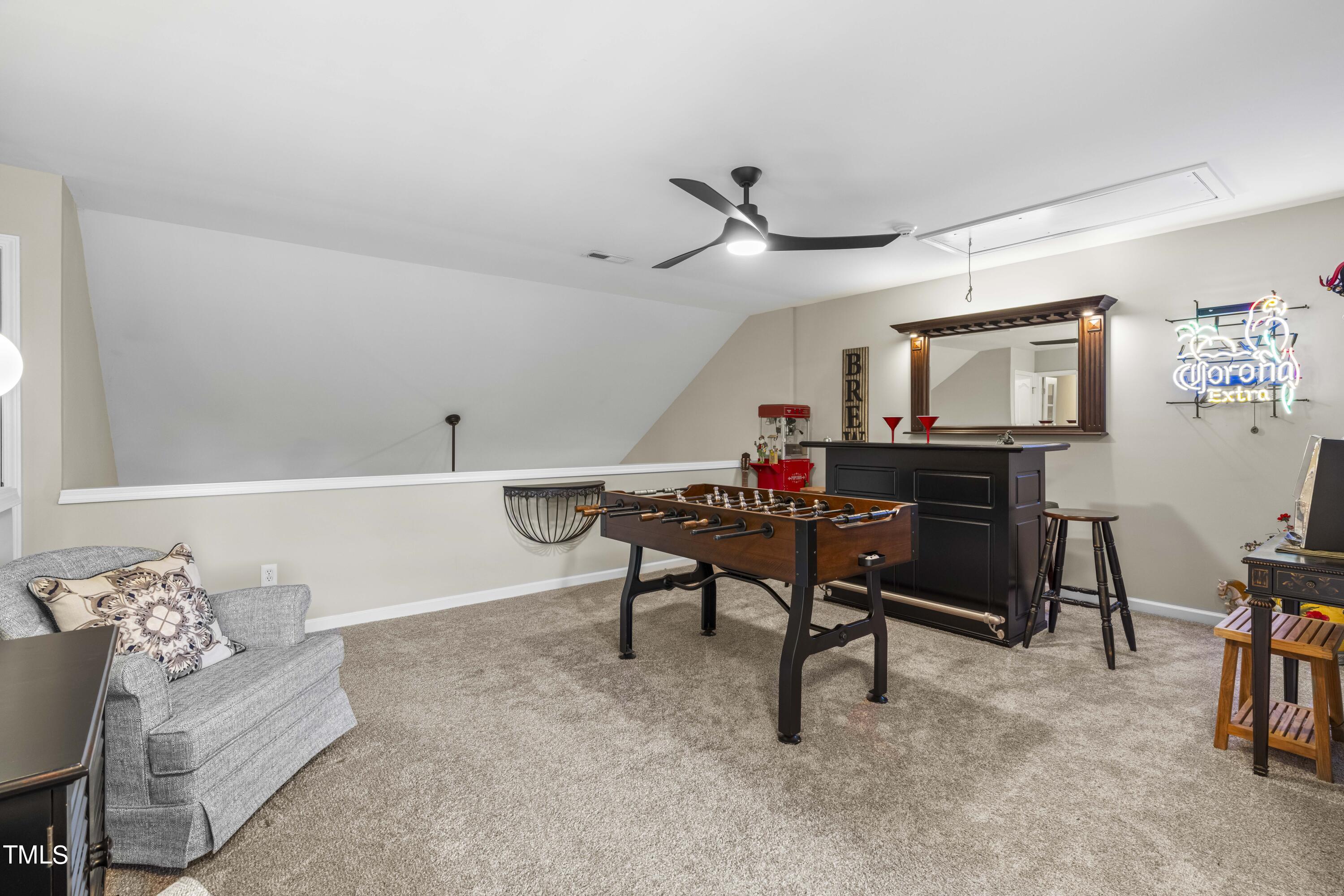 4604 Manassa Pope Lane Raleigh, NC 27612 - Photo 35 of 43 a living room with furniture and a large window
