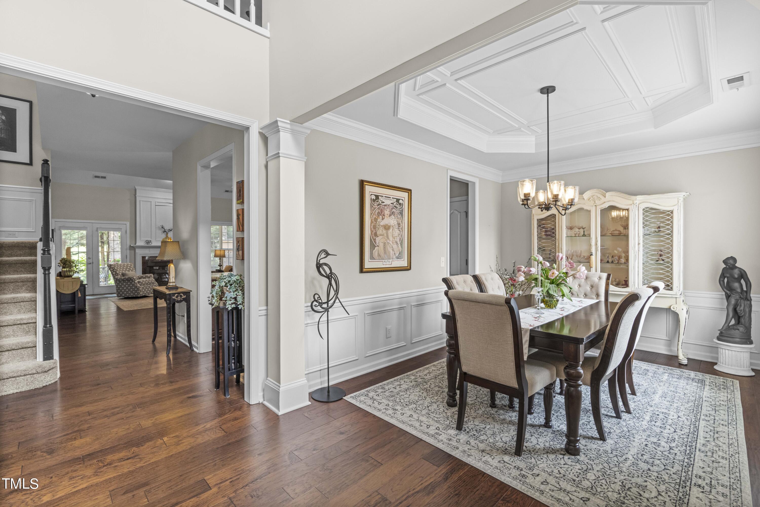 4604 Manassa Pope Lane Raleigh, NC 27612 - Photo 4 of 43 a view of a dining room with furniture window and wooden floor