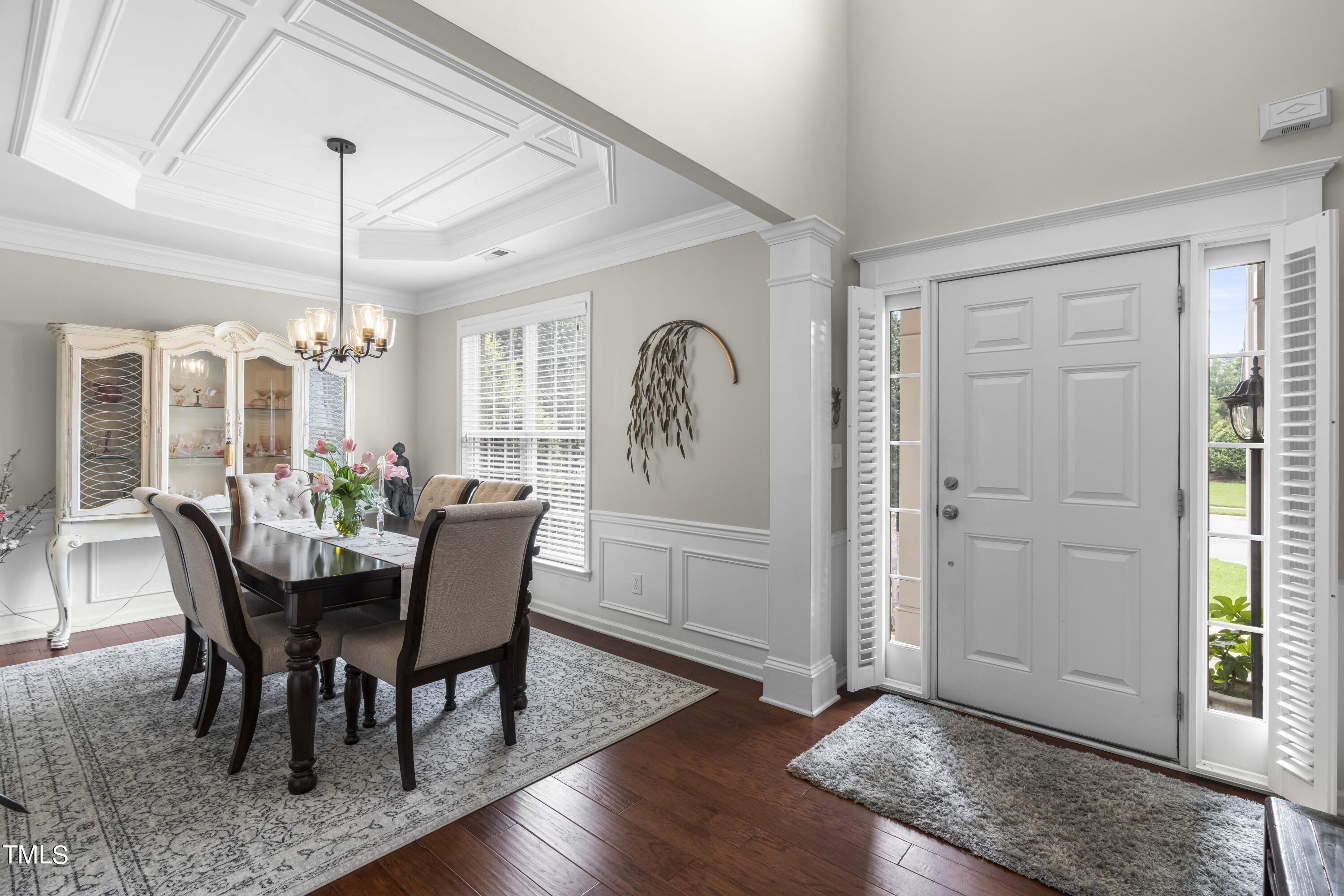 4604 Manassa Pope Lane Raleigh, NC 27612 - Photo 5 of 43 a view of a dining room with furniture window and wooden floor