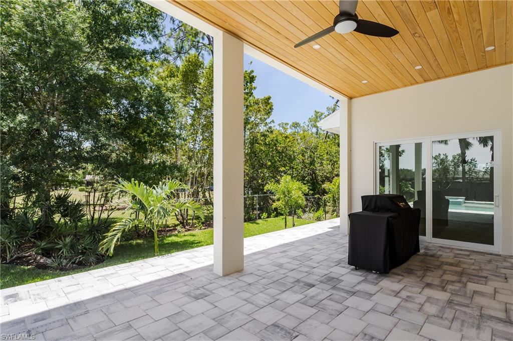 2854 Coach House Way Naples, FL 34105 - Photo 31 of 50 View of patio / terrace with ceiling fan and grilling area