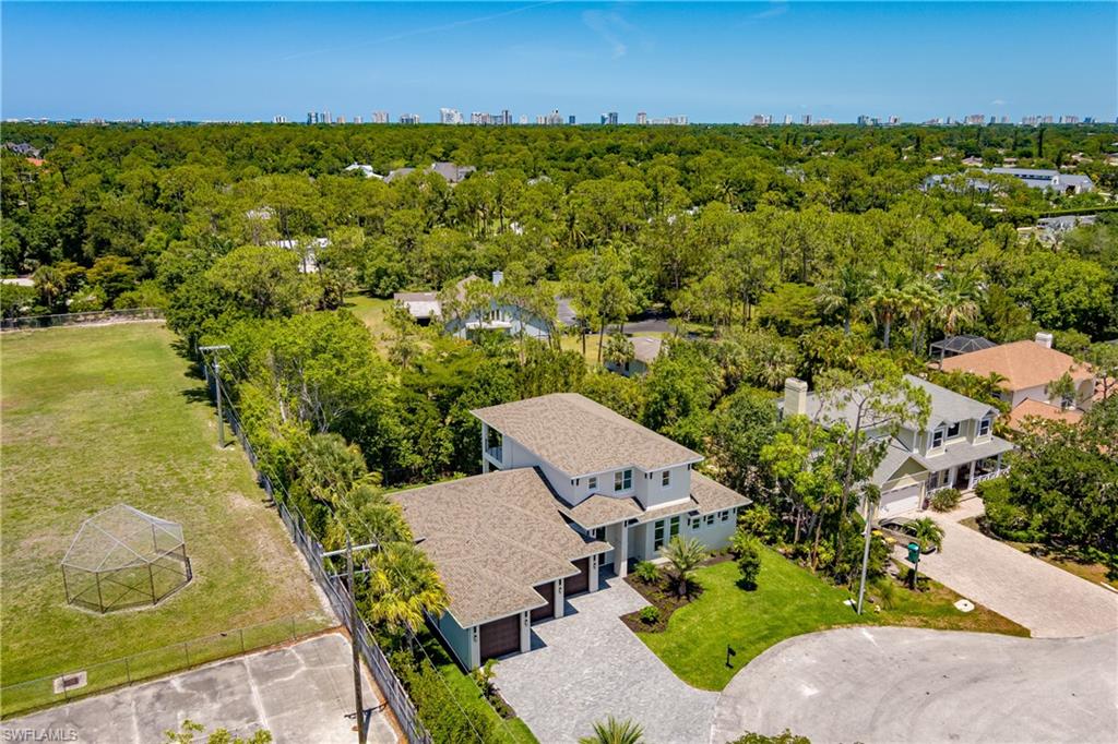 2854 Coach House Way Naples, FL 34105 - Photo 40 of 50 Drone / aerial view of skyline