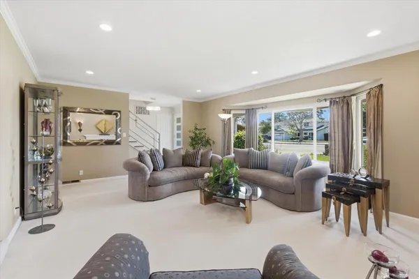 a kitchen with appliances a sink and cabinets