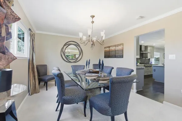 a living room with fireplace furniture and a flat screen tv