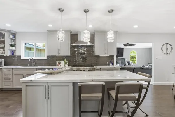 a work room with furniture and a lamp