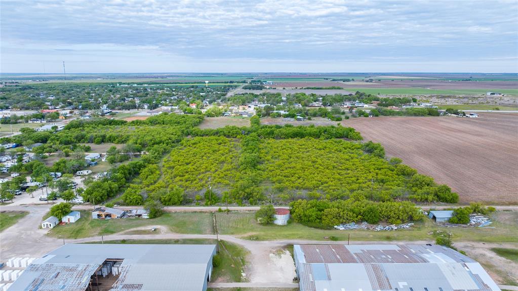 18.6-acres North Ave A Haskell, TX 79521 - Photo 2 of 13 an aerial view of a city with lots of residential buildings ocean and mountain view in back