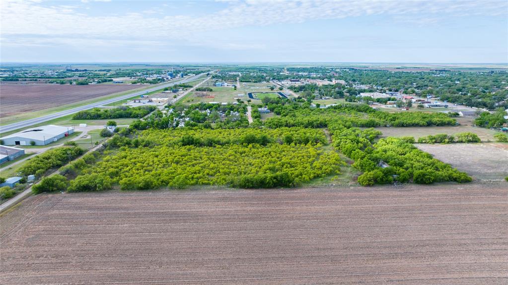 18.6-acres North Ave A Haskell, TX 79521 - Photo 5 of 13 an aerial view of a houses with a yard and lake view