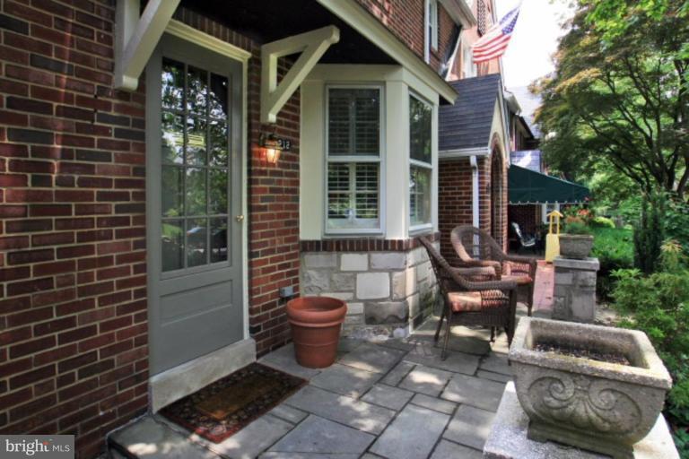212 Dunkirk Road Baltimore, MD 21212 - Photo 2 of 30 a view of a patio with couple of chairs and a fountain