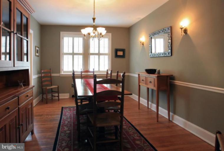 212 Dunkirk Road Baltimore, MD 21212 - Photo 11 of 30 a view of a dining room with furniture window and wooden floor