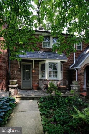 212 Dunkirk Road Baltimore, MD 21212 - Photo 3 of 30 a front view of a house with garden