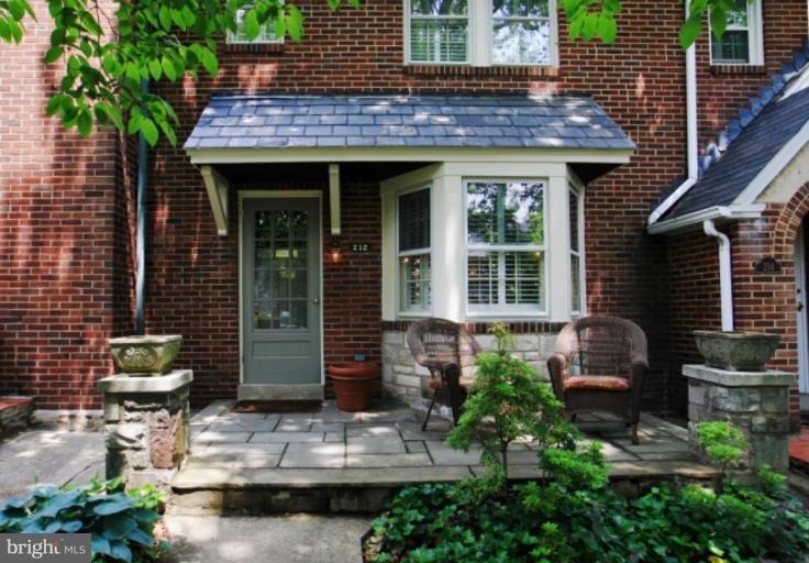 212 Dunkirk Road Baltimore, MD 21212 - Photo 24 of 30 a front view of a house with outdoor seating
