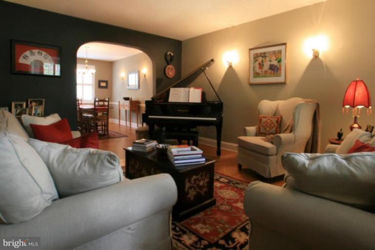 212 Dunkirk Road Baltimore, MD 21212 - Photo 25 of 30 a living room with furniture and a wooden floor
