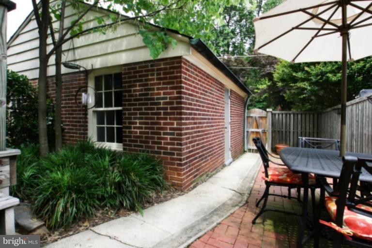 212 Dunkirk Road Baltimore, MD 21212 - Photo 6 of 30 a view of backyard with outdoor seating and green space