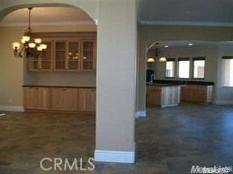 20552 Buchanan Hollow Road Le Grand, CA 95333 - Photo 13 of 26 a view of kitchen and dining room with chandelier
